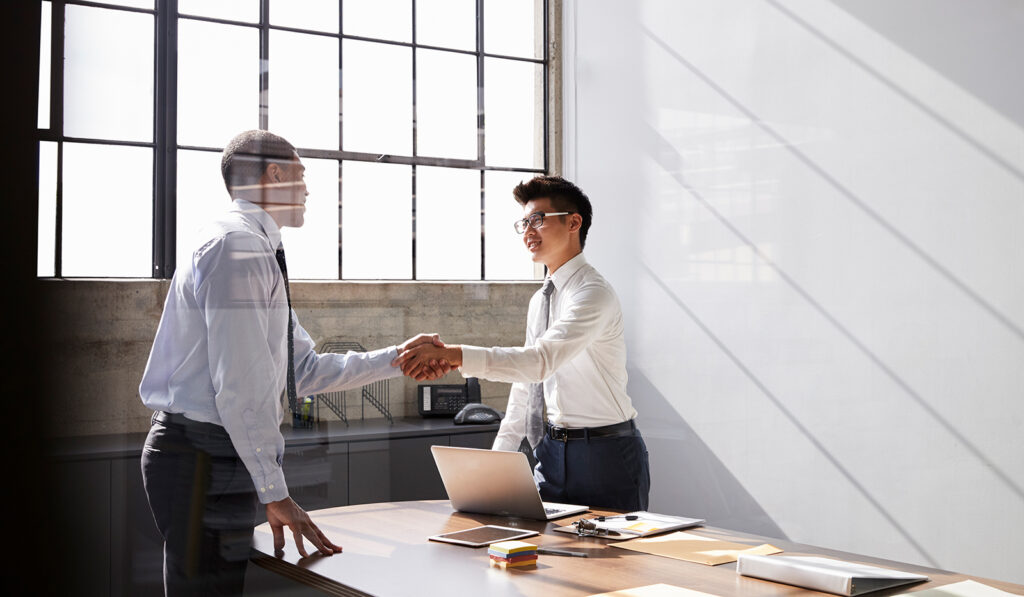 Business people shaking hands